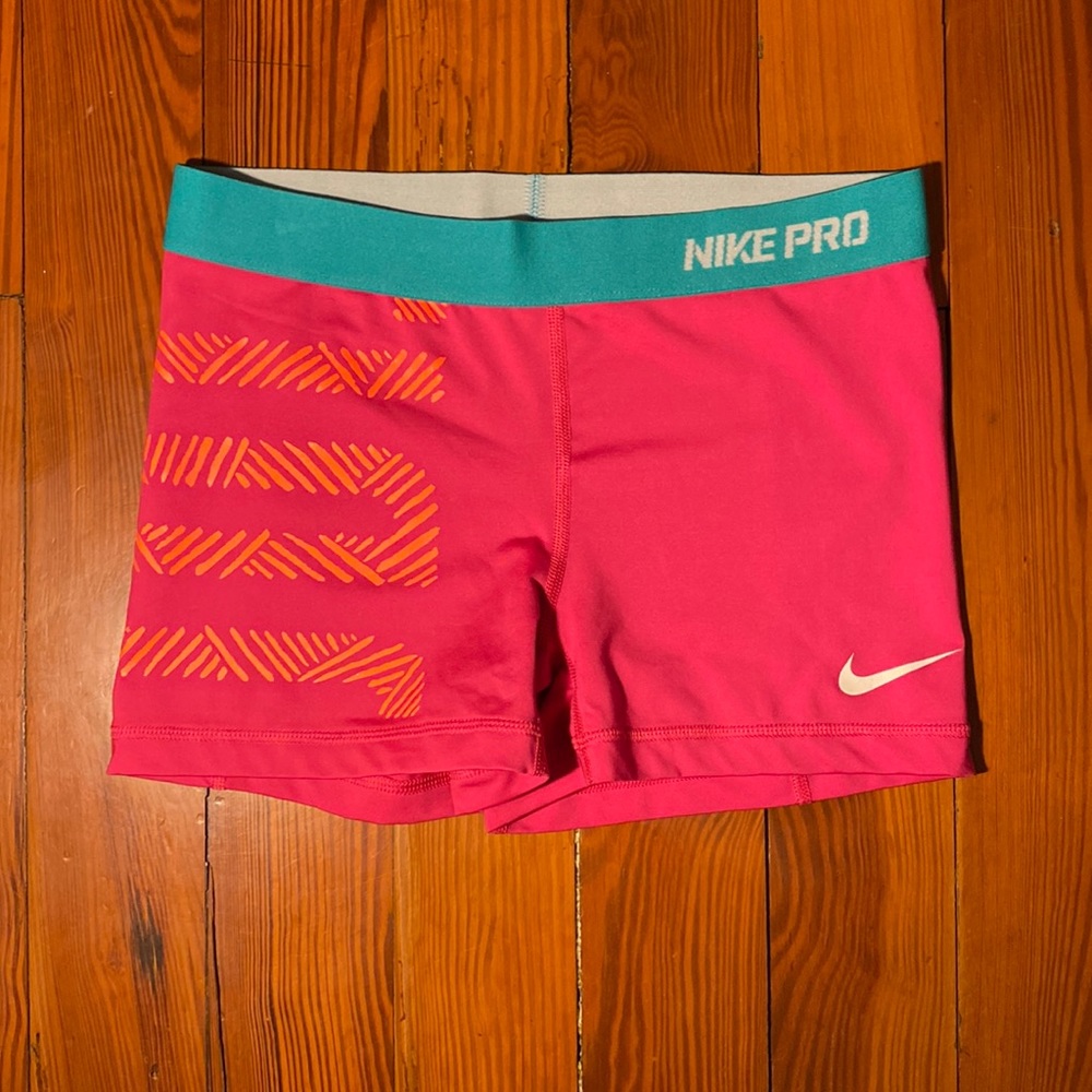 Pink Nike Pro Dri-Fit shorts